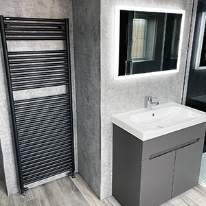 Radiator and bathroom mirror