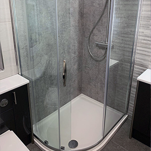 Corner shower enclosure installed